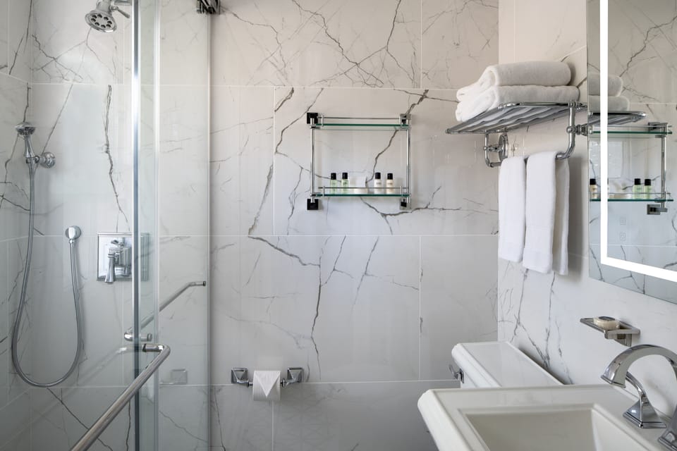 Shower, bathrobes, towels