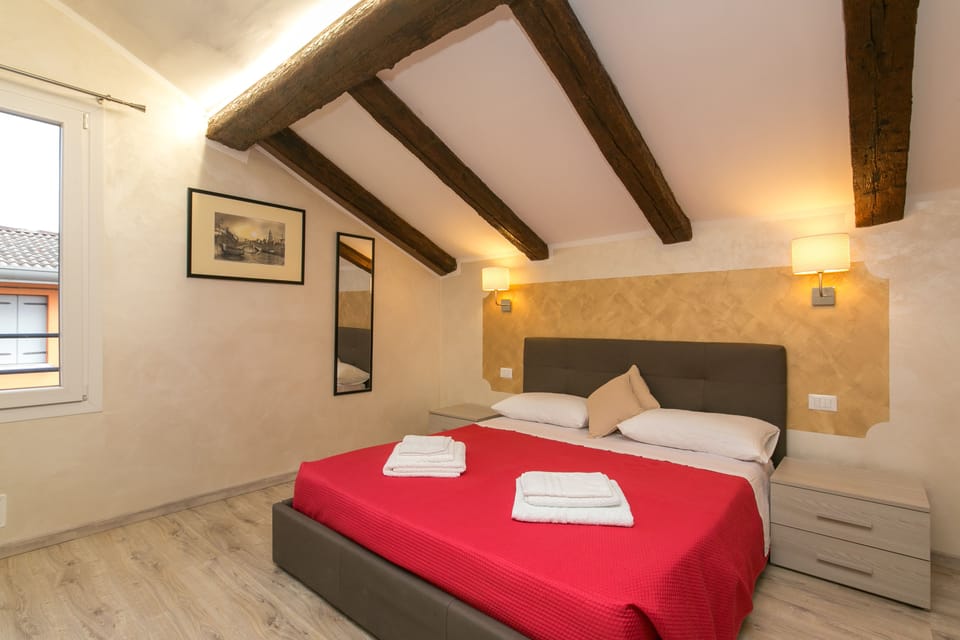 Comfort Room (Room 5) | Down comforters, pillowtop beds, desk, laptop workspace