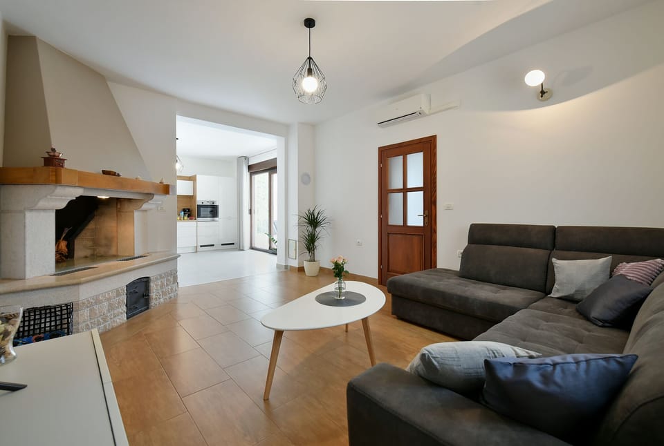 Standard House, 2 Bedrooms (0287) | Living area | TV, fireplace