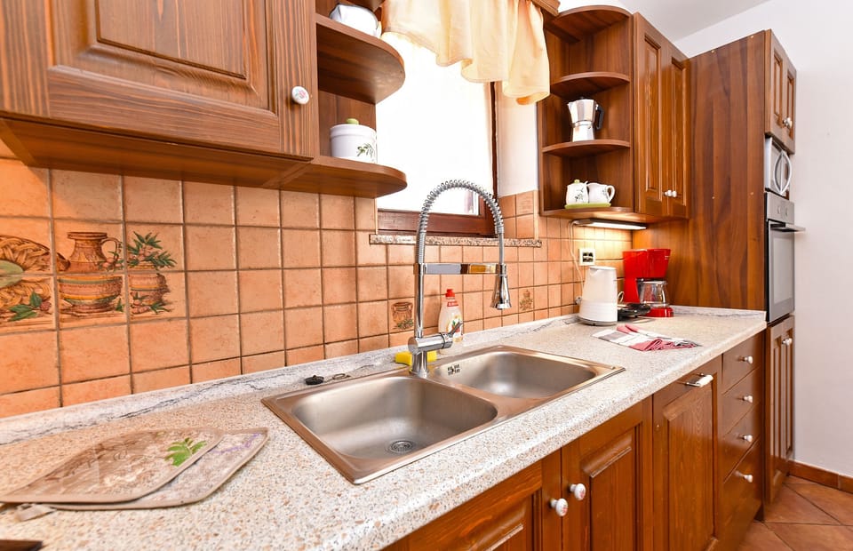 Standard Apartment, 3 Bedrooms (0403) | Private kitchen | Fridge, microwave, oven, stovetop