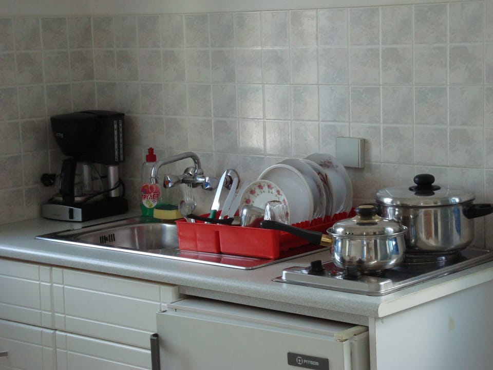 Fridge, stovetop, coffee/tea maker, electric kettle