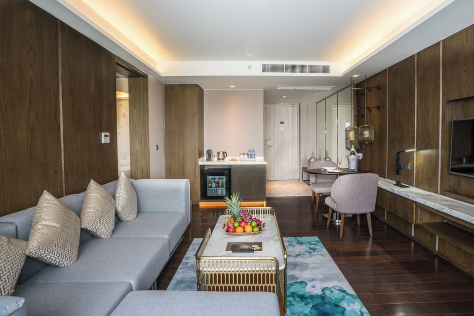 Premier Corner Room with Spa Package | Living area | 50-inch Smart TV with satellite channels, TV, fireplace