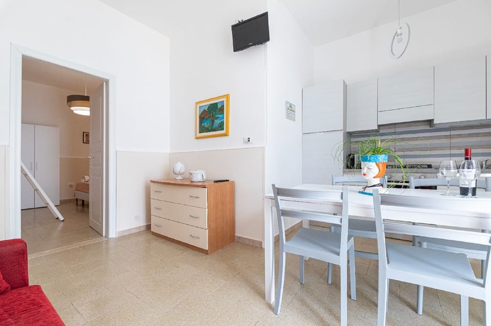 Comfort Apartment, 1 Bedroom, Patio | Living area | 32-inch flat-screen TV with digital channels