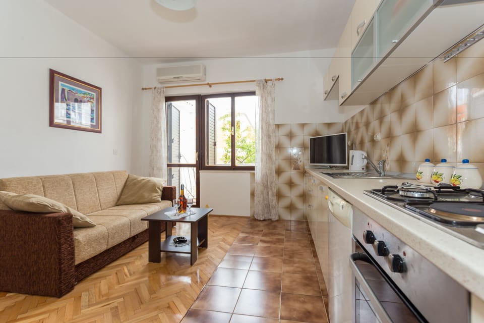 Superior Apartment, 1 Bedroom, Balcony, Garden View | Living area | LCD TV