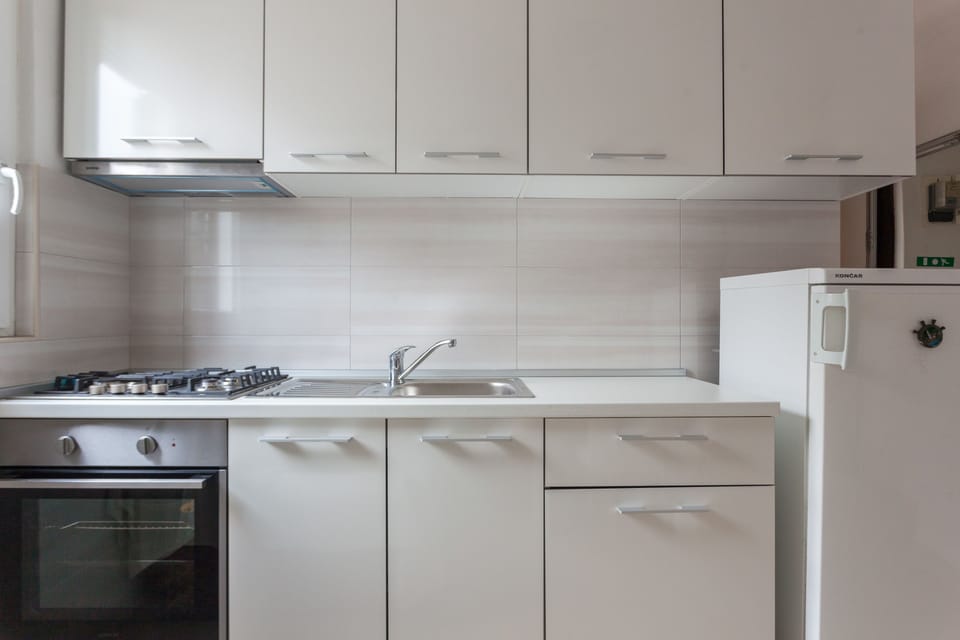 Standard Apartment, 1 Bedroom, Balcony, Partial Sea View | Private kitchen | Full-size fridge, microwave, stovetop, coffee/tea maker