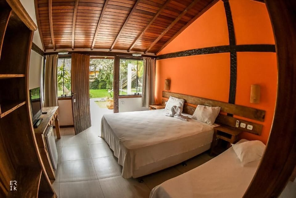 Superior Triple Room | Minibar, in-room safe, bed sheets