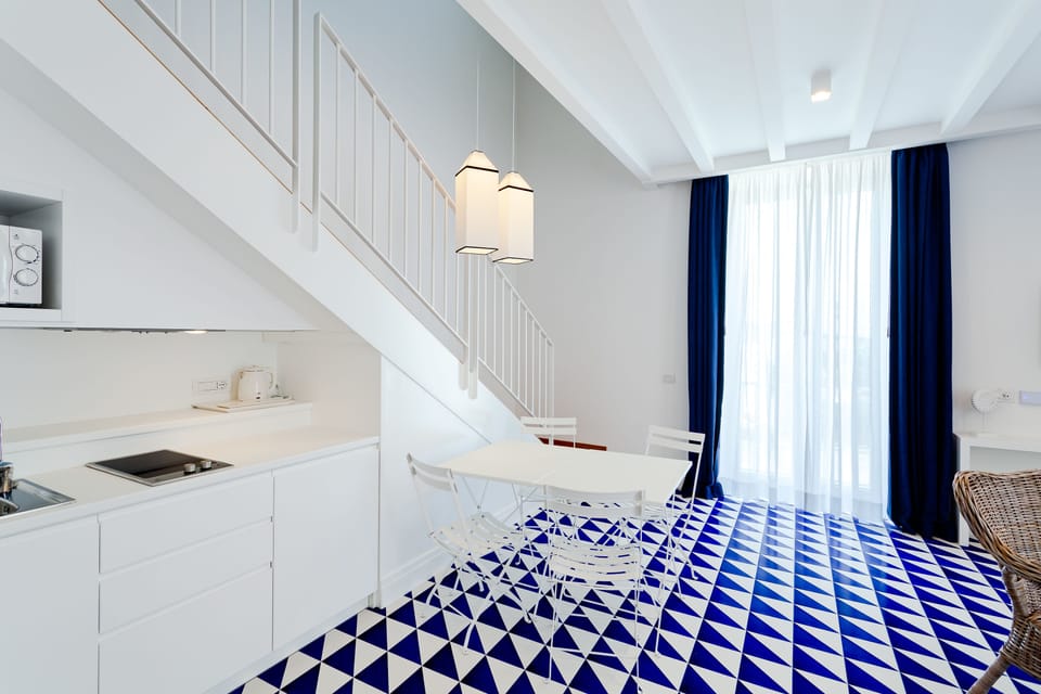 Family Suite, Multiple Beds, Kitchenette | Premium bedding, memory foam beds, in-room safe, desk