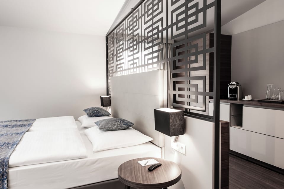 Junior Suite | 1 bedroom, premium bedding, in-room safe, soundproofing