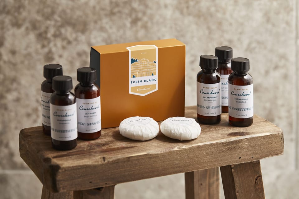 Designer toiletries, hair dryer, bathrobes, slippers
