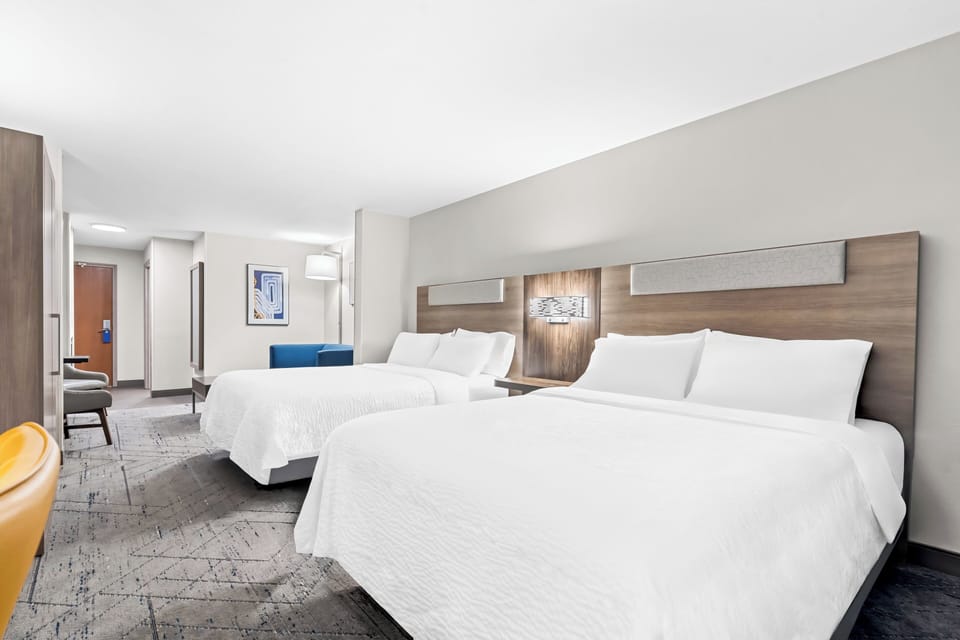 Suite, Multiple Beds | Desk, iron/ironing board, free cribs/infant beds, free rollaway beds