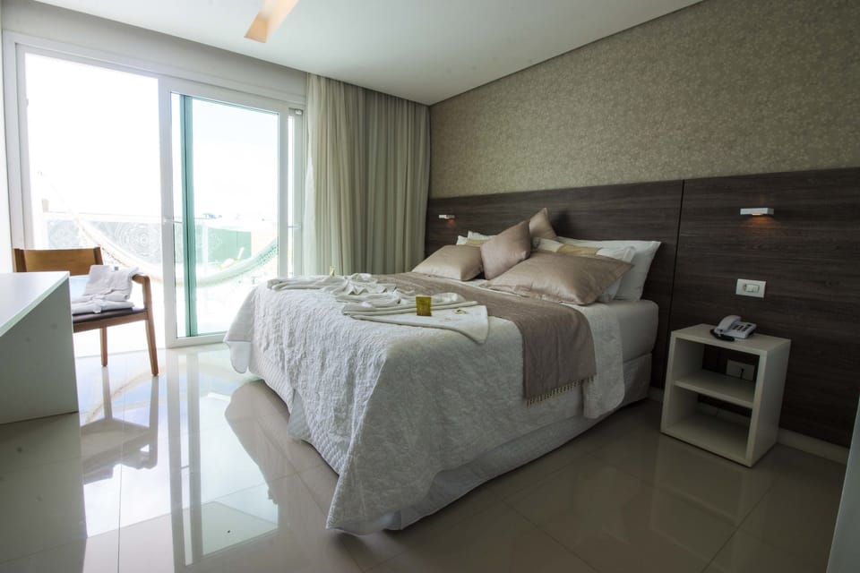 Superior Double Room, Pool View | Minibar, desk, soundproofing, iron/ironing board