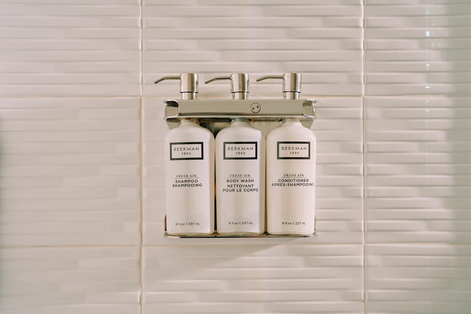 Combined shower/tub, designer toiletries, hair dryer, bathrobes