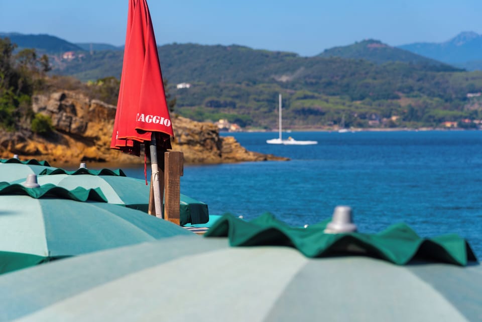 Beach nearby, white sand, sun loungers, beach umbrellas