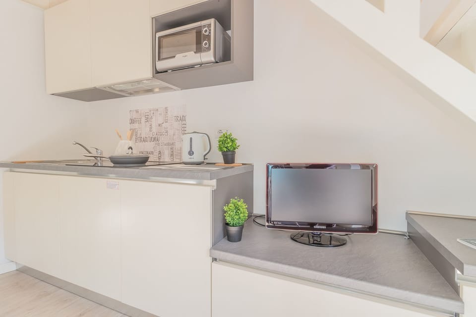 Apartment, 1 Bedroom | Private kitchen | Fridge, microwave, stovetop, dishwasher