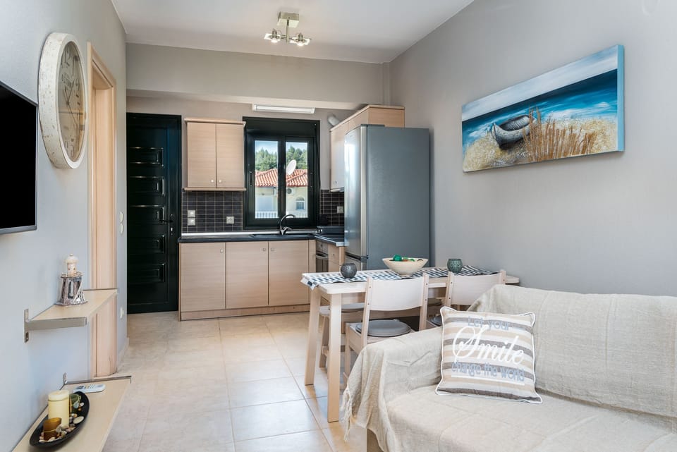 Premium Apartment | Living room | Flat-screen TV