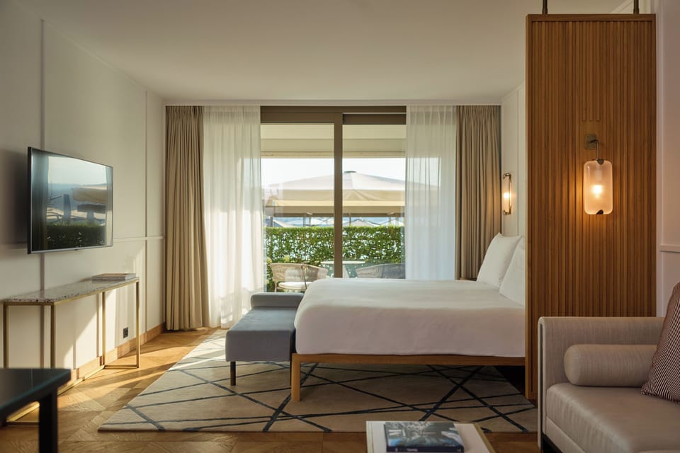 Premium bedding, memory foam beds, free minibar items, in-room safe