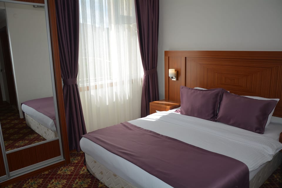 Family Room, 2 Bedrooms | Minibar, desk, blackout drapes, rollaway beds