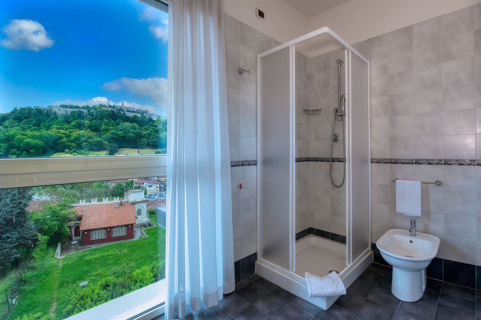 Shower, free toiletries, hair dryer, bidet