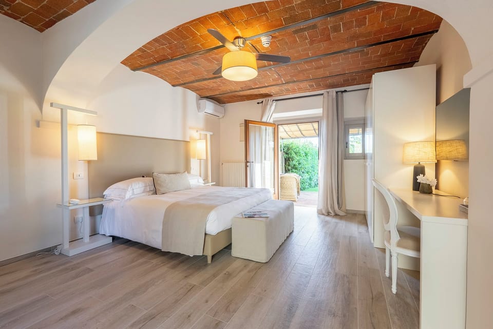 Standard Double Room, Patio | Minibar, in-room safe, desk, free WiFi