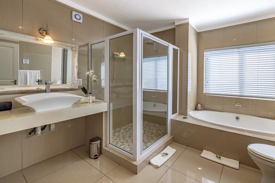 Rainfall showerhead, free toiletries, hair dryer, bathrobes