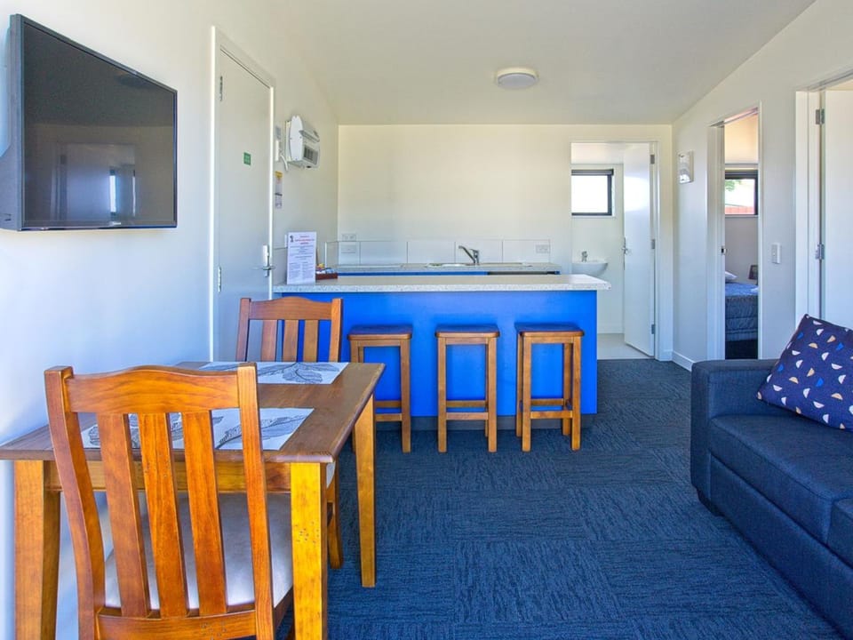 Two Bedroom Motel Unit | Private kitchenette | Shared fridge, shared microwave, highchair, cookware/dishes/utensils