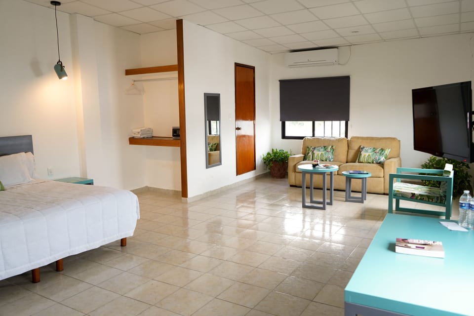 Junior Suite | Premium bedding, down comforters, blackout drapes, free WiFi