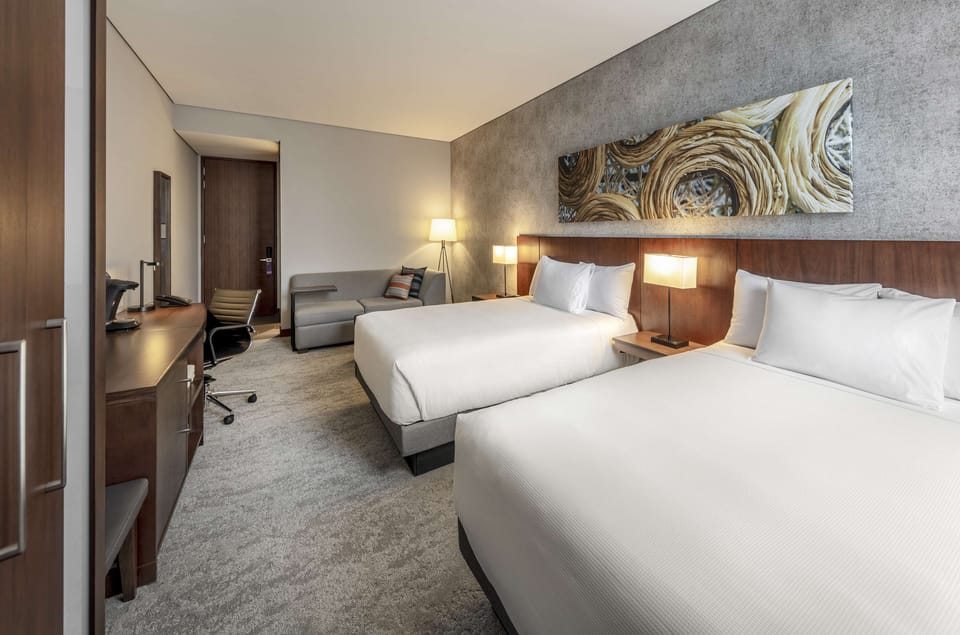 Premium bedding, down comforters, Select Comfort beds, minibar