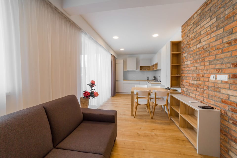 Comfort Apartment | Living room | Flat-screen TV