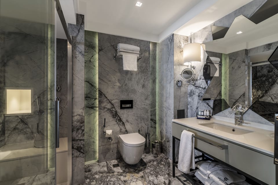 Shower, free toiletries, hair dryer, slippers