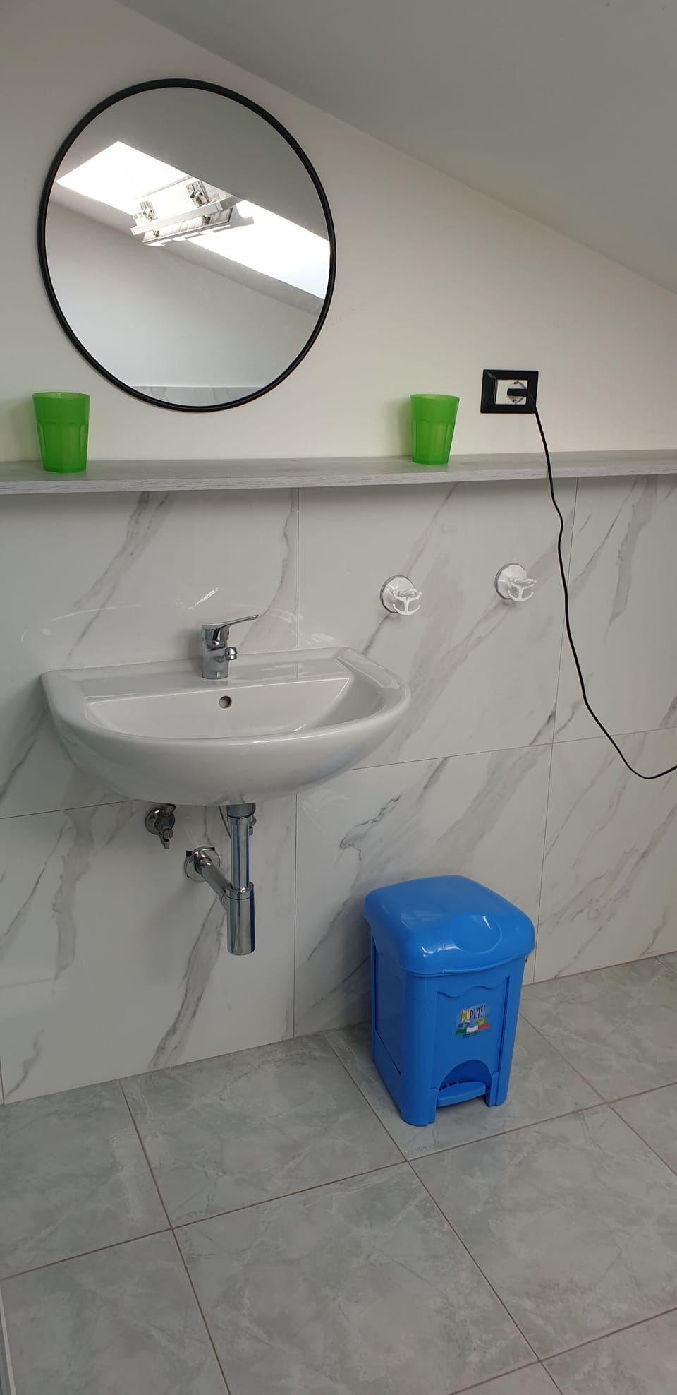 Shower, rainfall showerhead, hair dryer, towels