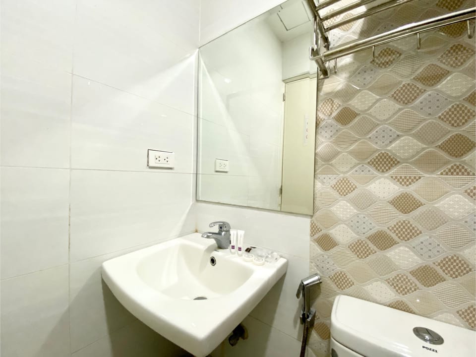 Shower, slippers, bidet, towels