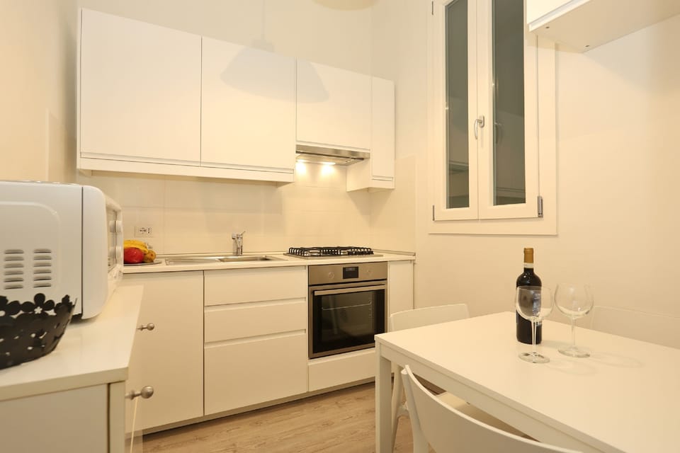 Apartment, 1 Bedroom | Private kitchen | Full-size fridge, microwave, oven, stovetop