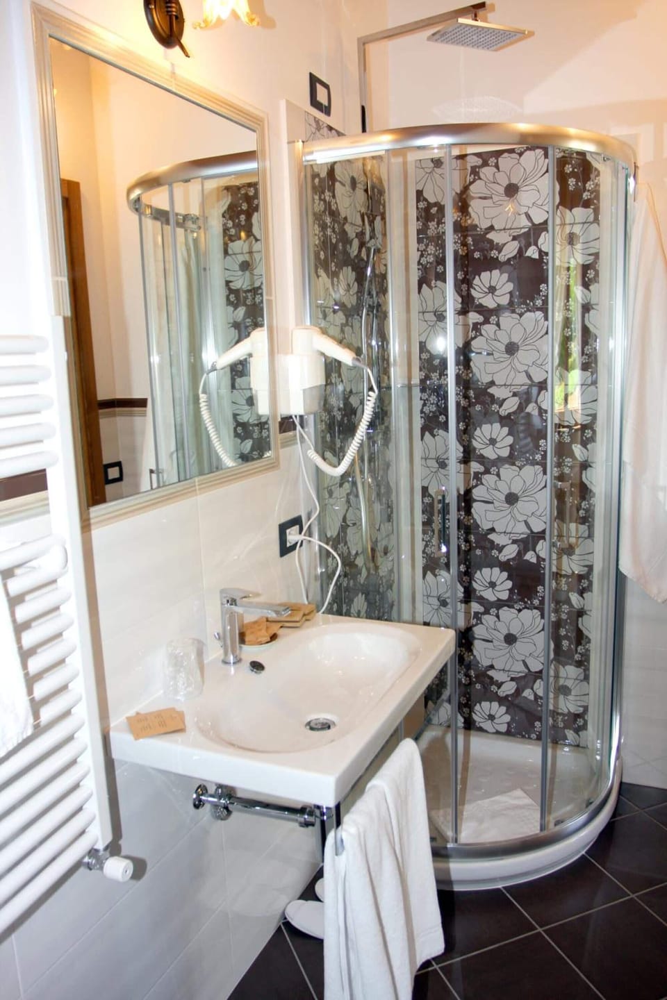 Shower, free toiletries, hair dryer, slippers