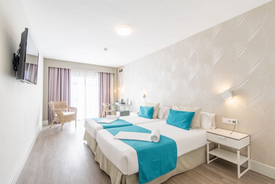 Blackout drapes, iron/ironing board, free WiFi, bed sheets