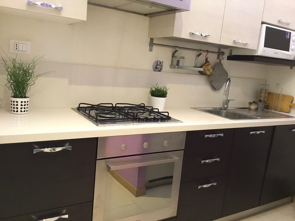 Apartment, 2 Bedrooms | Private kitchen | Full-size fridge, microwave, oven, stovetop