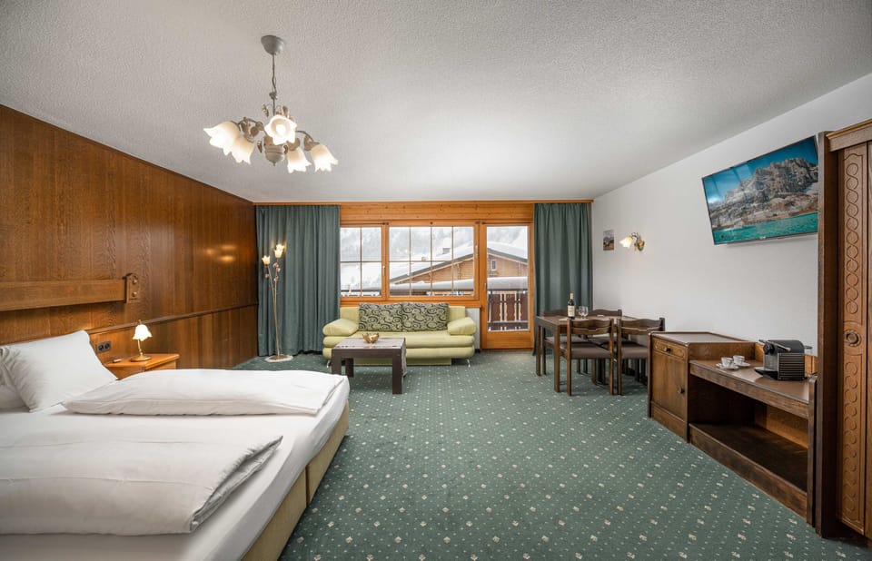 Family Studio, Balcony, Mountain View | In-room safe, individually decorated, desk, laptop workspace