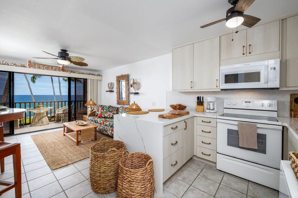 Condo, 1 King Bed (Kona Isle E23) | Private kitchen | Fridge, microwave, oven, stovetop