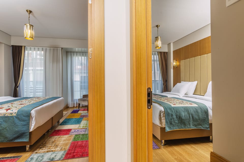 Family Room, 2 Bedrooms, Non Smoking, City View | Minibar, in-room safe, blackout drapes, soundproofing