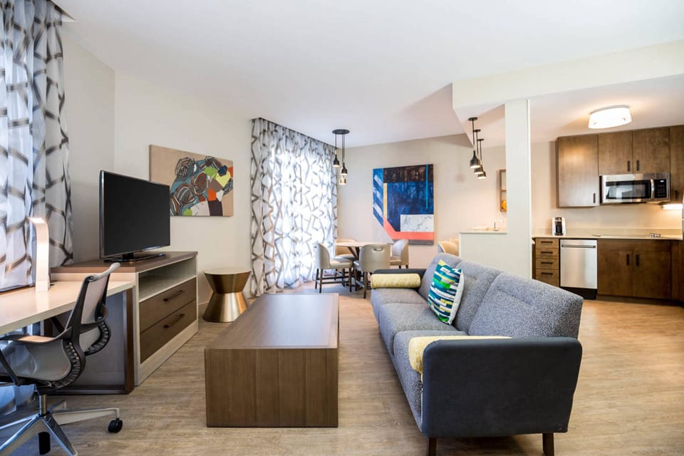 Suite, 1 Bedroom, Corner | Living room | 47-inch LED TV with digital channels, TV, pay movies