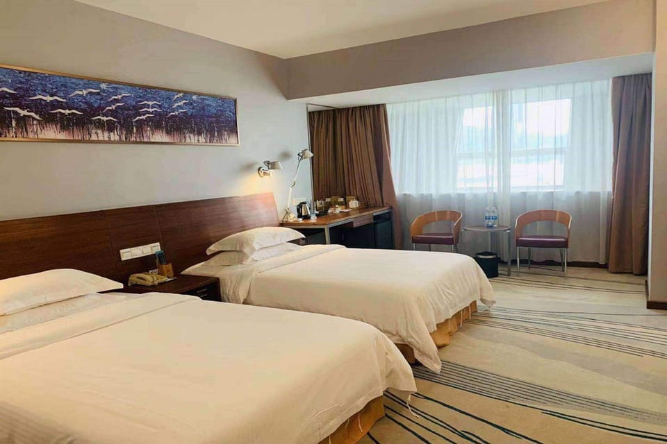 Minibar, in-room safe, desk, rollaway beds