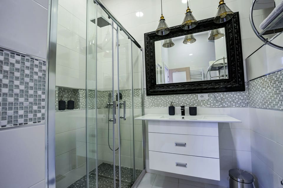 Family Apartment, 1 King Bed, Garden View | Bathroom | Shower, free toiletries, hair dryer, towels