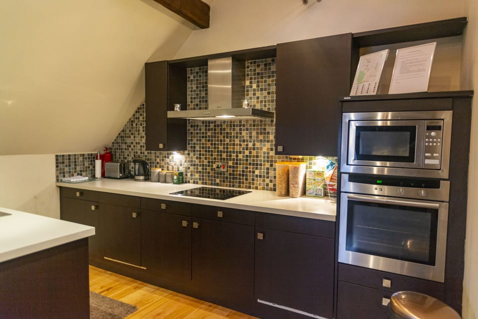 Apartment | Private kitchen | Full-size fridge, microwave, oven, stovetop