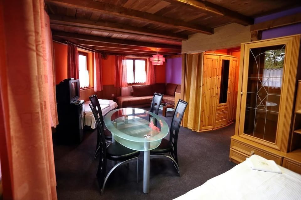 Superior Room, Multiple Beds | Living area | Flat-screen TV