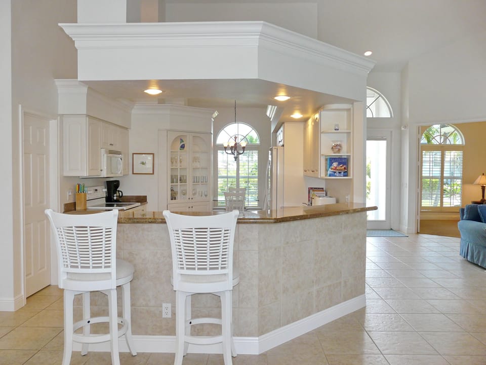 House, Multiple Beds (Relaxing waterfront home with pool an) | Private kitchen | Fridge, microwave, oven, stovetop
