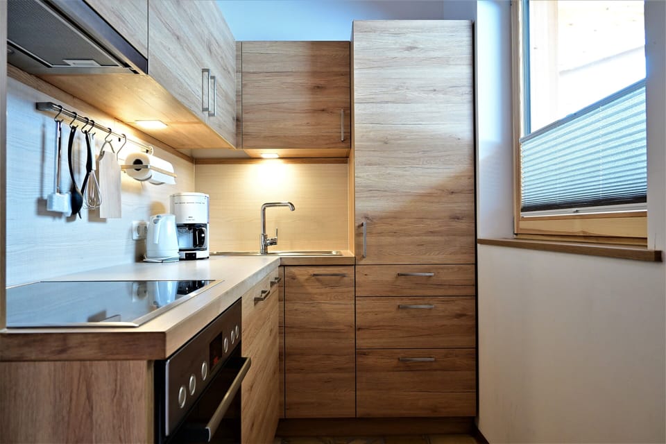 Family Apartment, 1 King Bed with Sofa bed, Mountain View (Wetterstein incl. cleaning fee 70 EUR) | Private kitchen | Espresso maker, coffee/tea maker, electric kettle, highchair