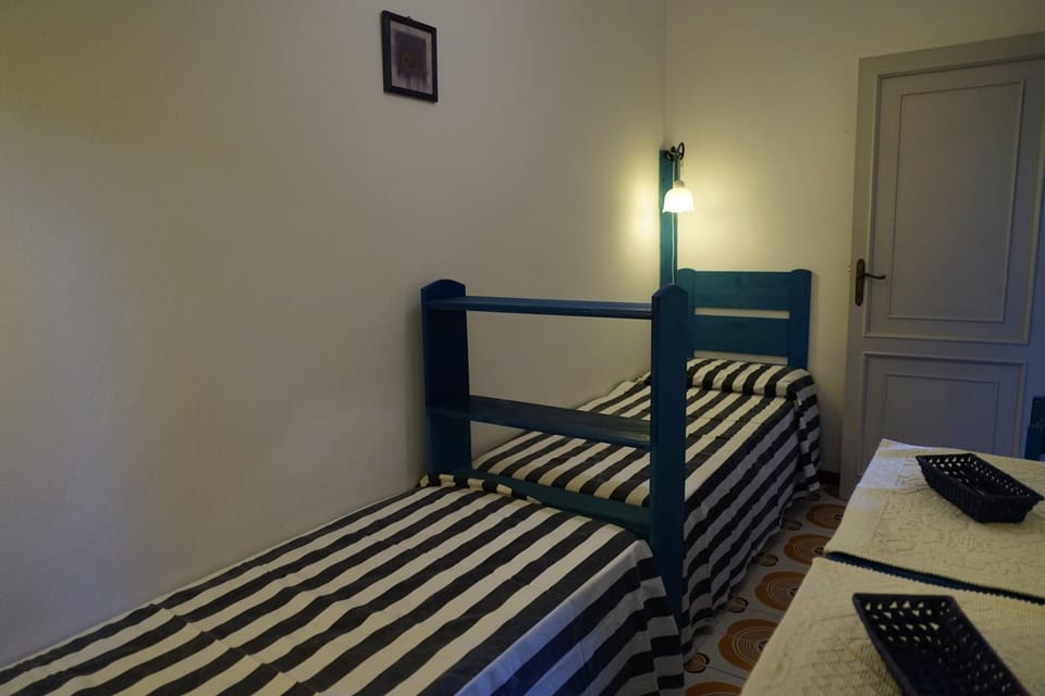 Apartment, 2 Bedrooms | Iron/ironing board, cribs/infant beds, rollaway beds, free WiFi