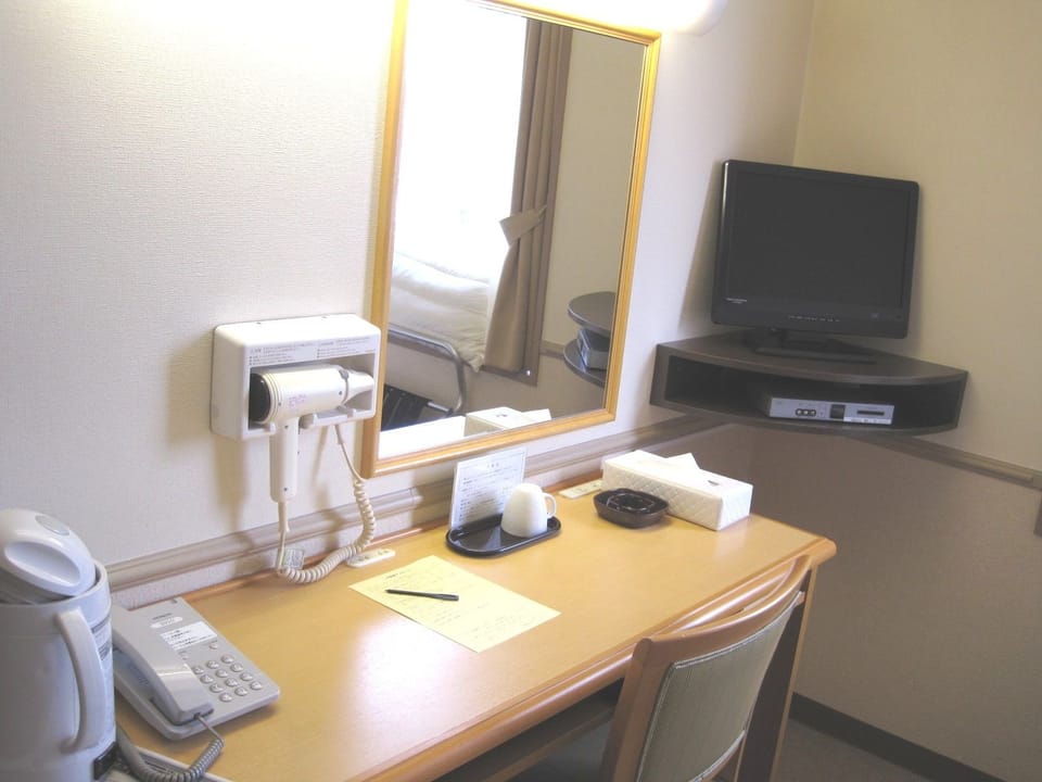 Desk, free WiFi, bed sheets