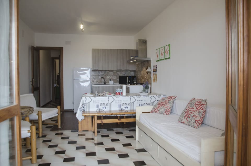 Apartment, 1 Bedroom | Living area | Flat-screen TV