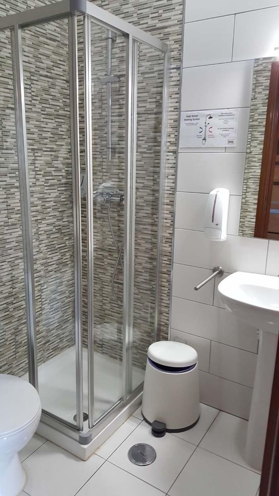 Shower, free toiletries, hair dryer, towels