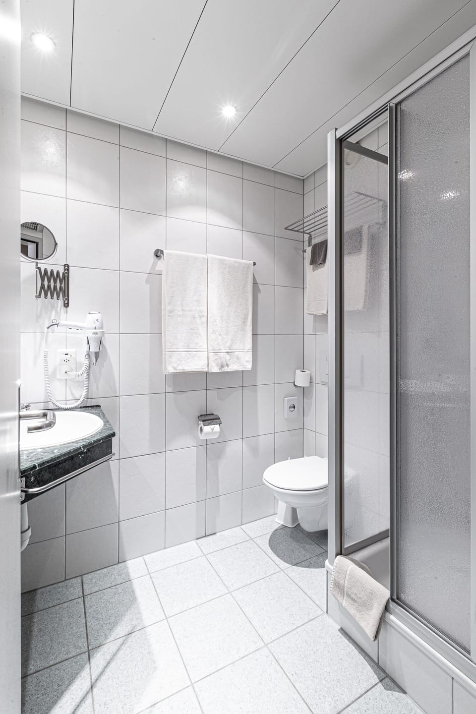 Shower, free toiletries, hair dryer, towels
